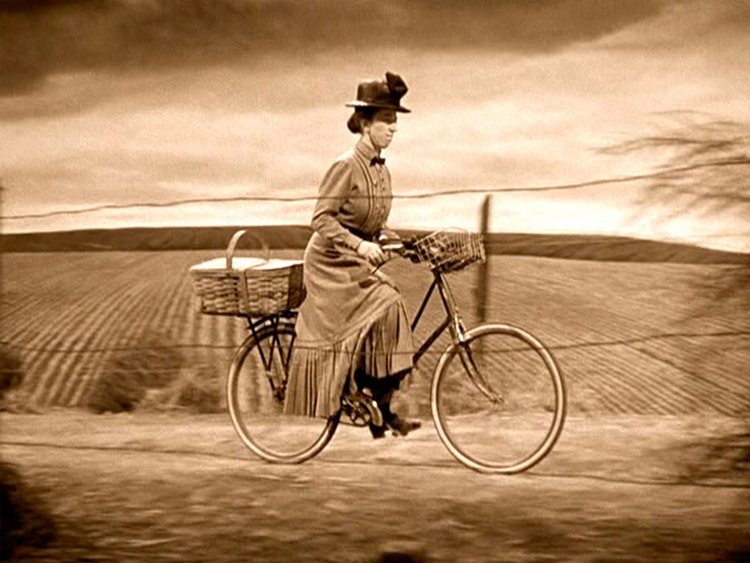 movie scenes with women riding bicycles